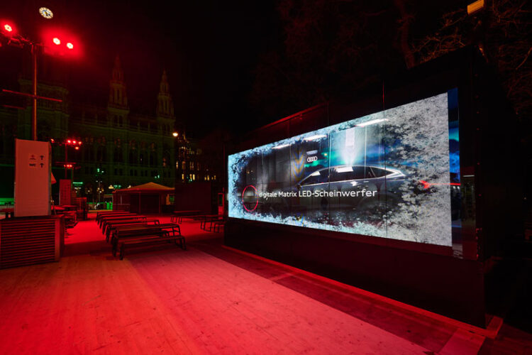 The SQ8 Sportback from Audi staged behind transparent LED (Photo: AV Stumpfl)