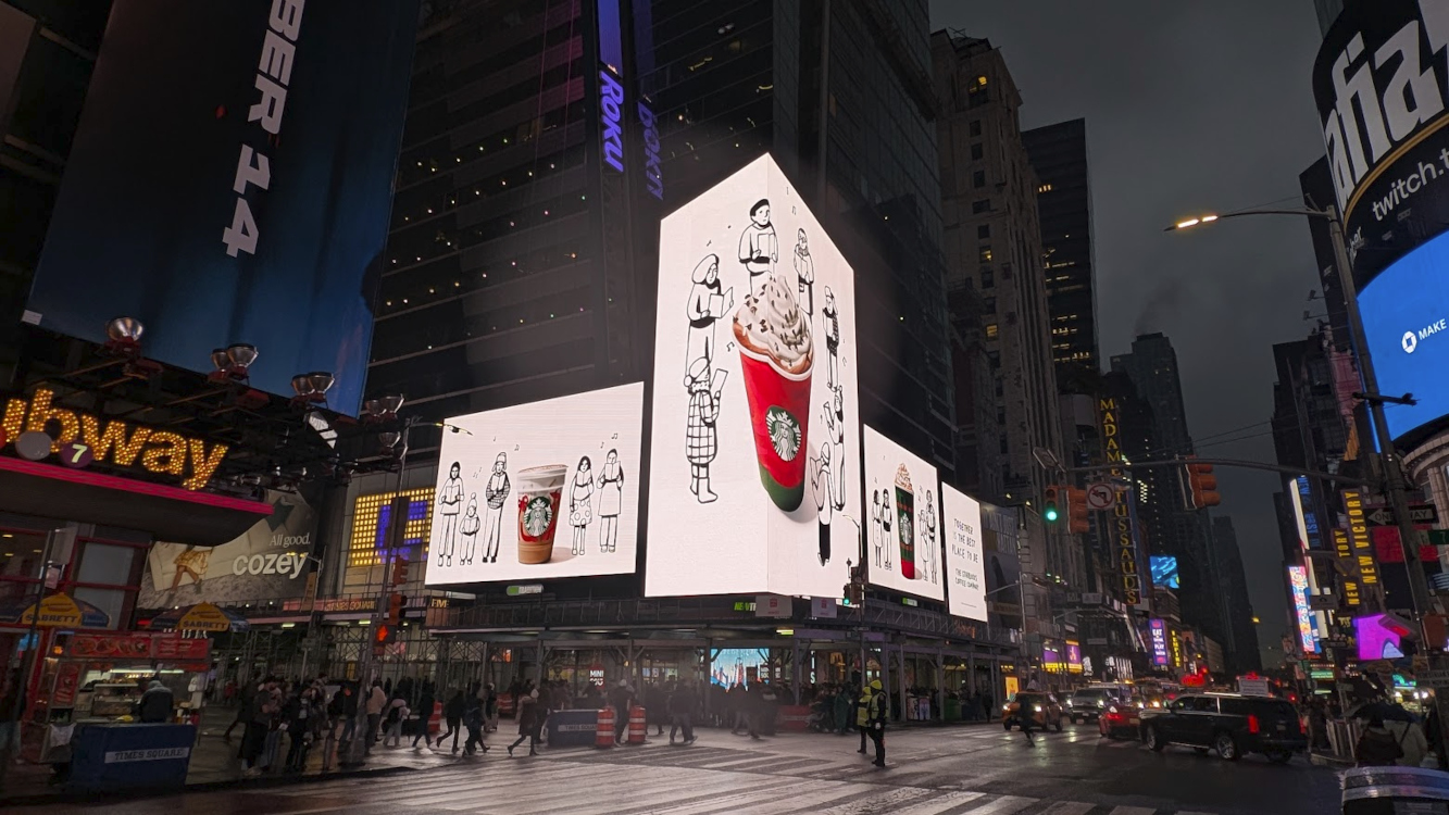 Starbucks: Hand‑Drawn Magic Hits Screens and Streets - Starbucks 'Drawn Together" Christmas campaign at Times Square (Image: invidis) Starbucks 'Drawn Together" Christmas campaign at Times Square (Image: invidis)