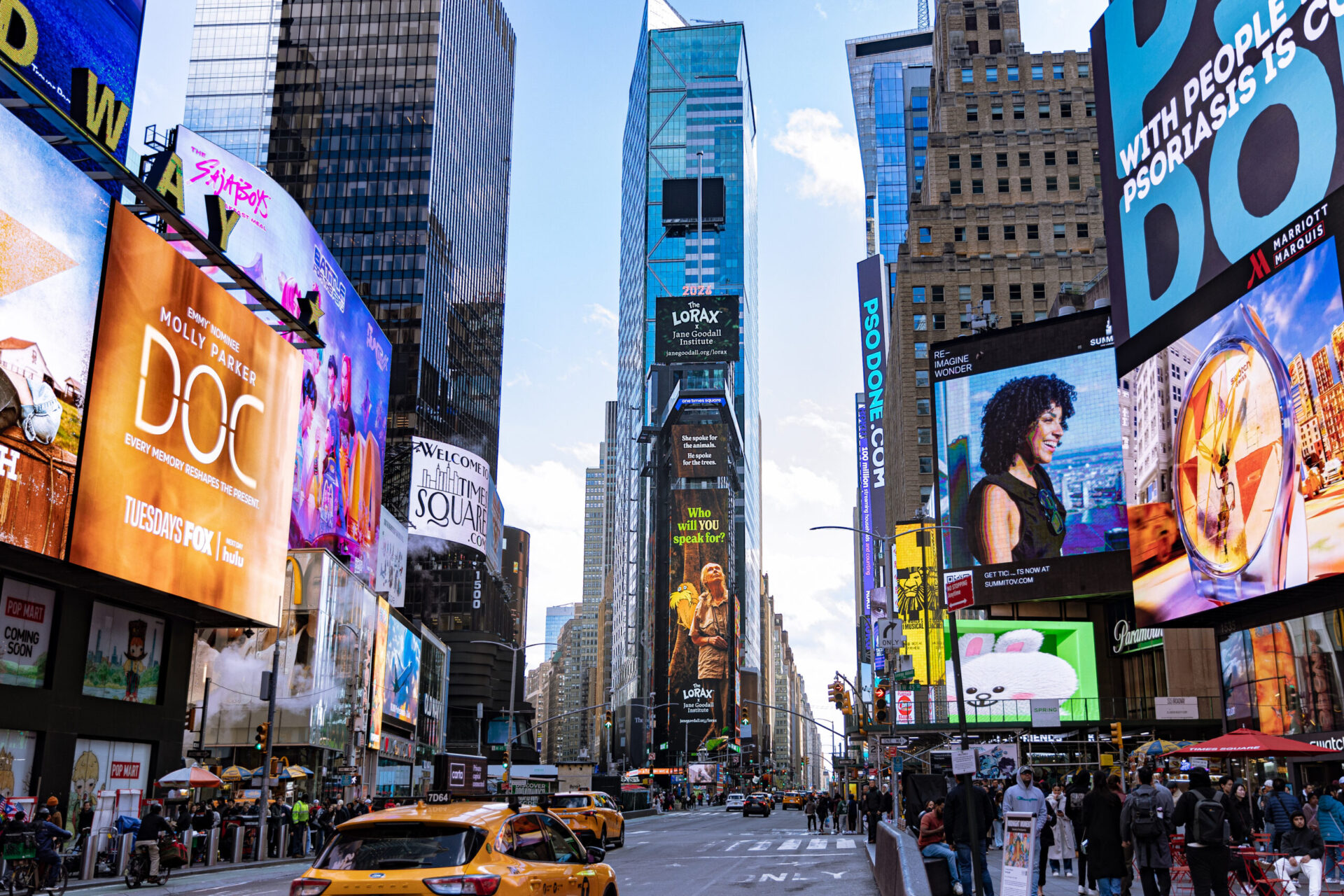 Lorax and Jane Goodall creative displayed in Times Square as part of Earth Day DooH campaign