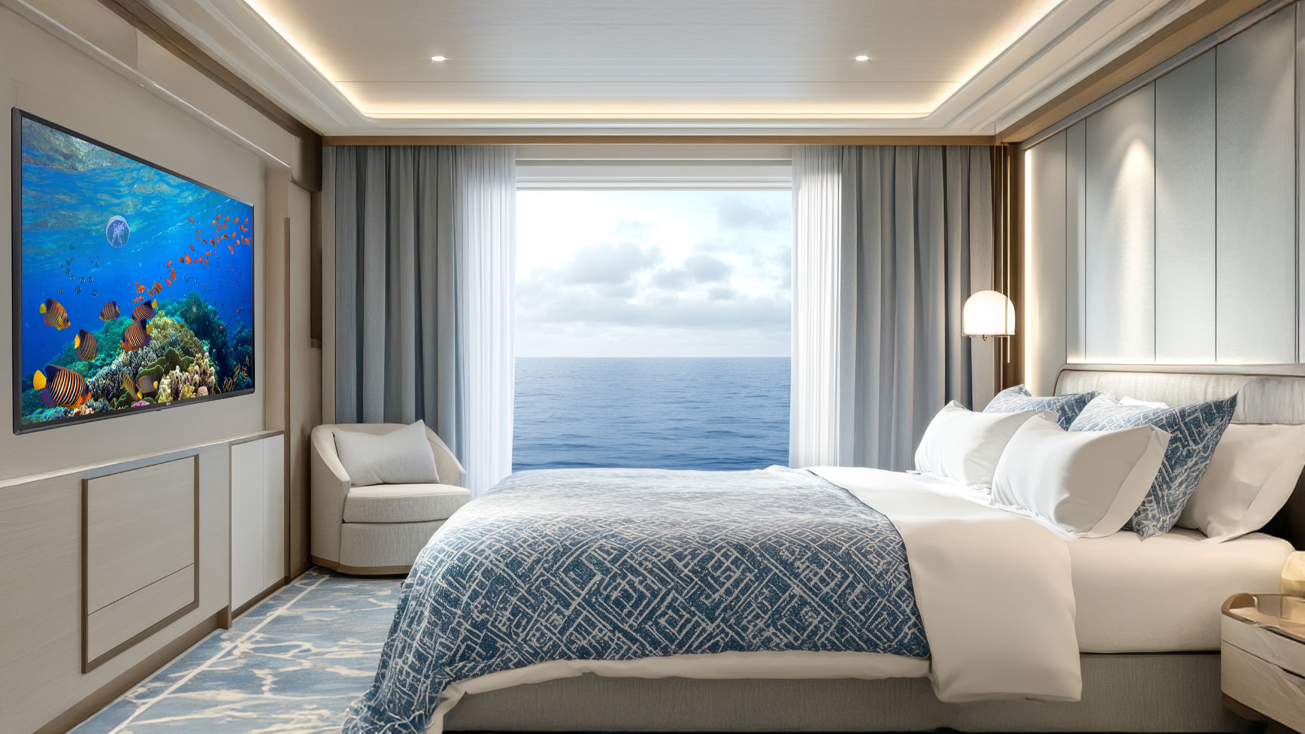 Cruise stateroom with in-room display and ocean view