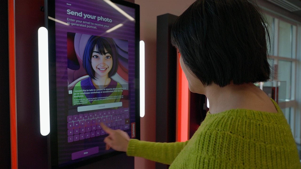 A visitor uses one of three AI Journey Accelerator kiosks at Lenovo's Executive Briefing Center, where on-premise AI processing generates personalized portraits based on questionnaire responses (Image: Firestone Studios)