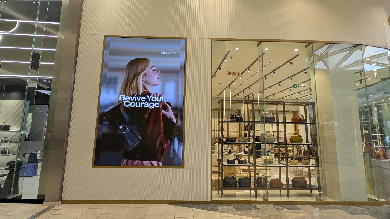 Coach digital signage content adoption (Image: invidis)