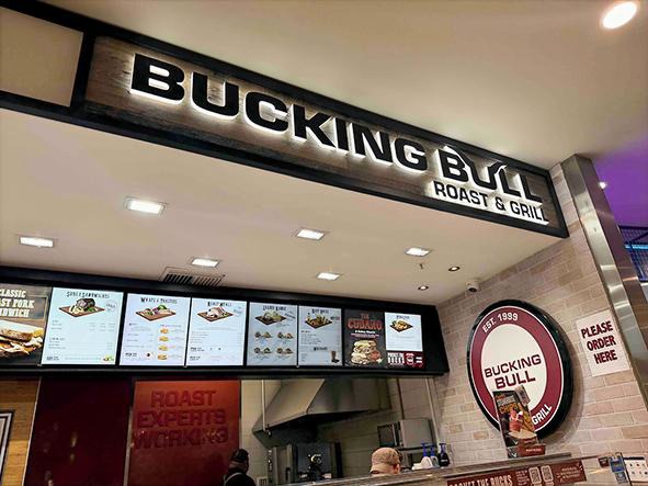 Digital menu boards at a Bucking Bull Roast & Grill location, one of two Aktiv Brands QSR concepts using Fusion Signage (Image: Aktiv Brands)
