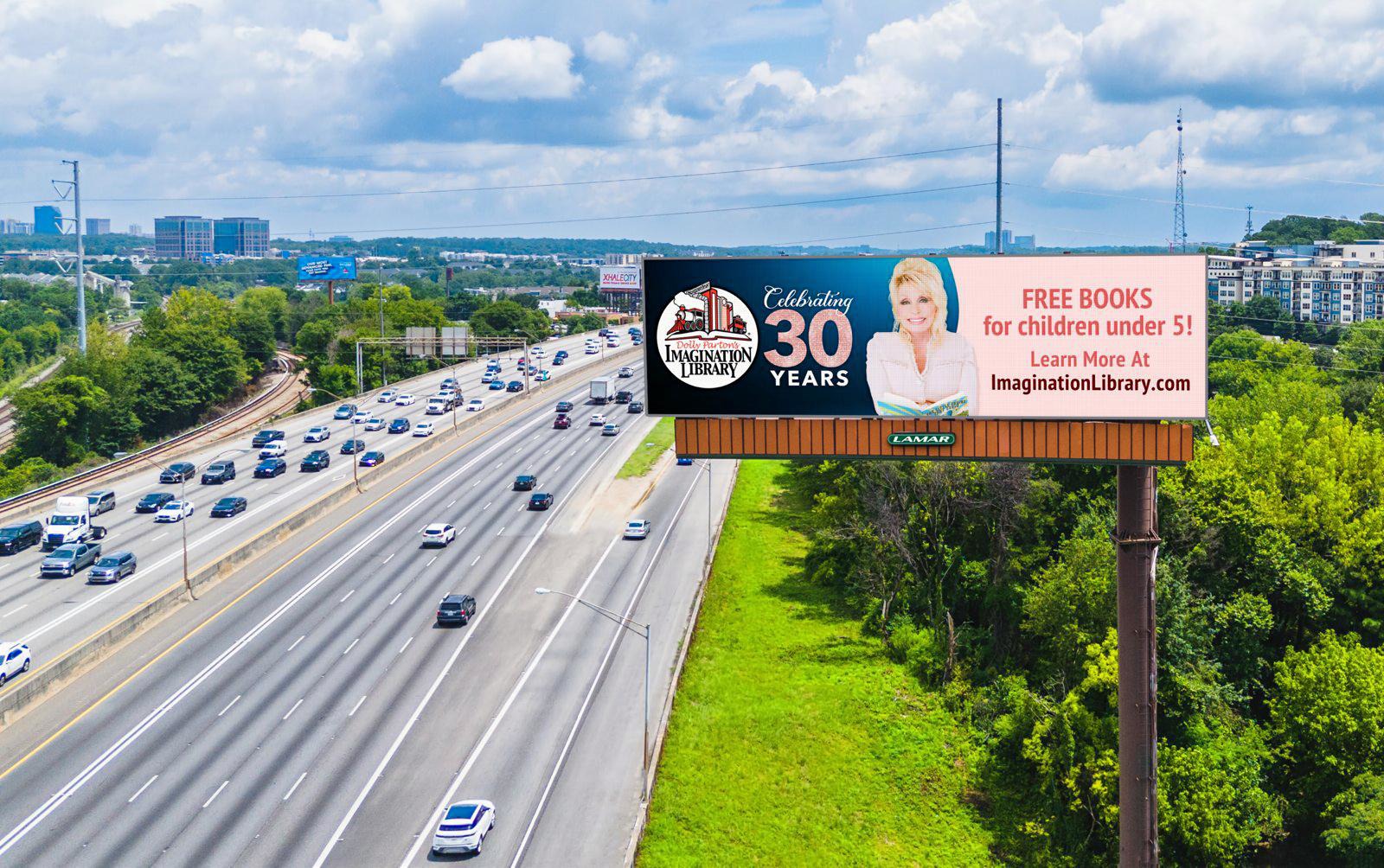 Lamar Advertising used its digital billboard network to promote Dolly Parton’s Imagination Library as part of a yearlong partnership supporting the childhood literacy program (Image: Lamar)