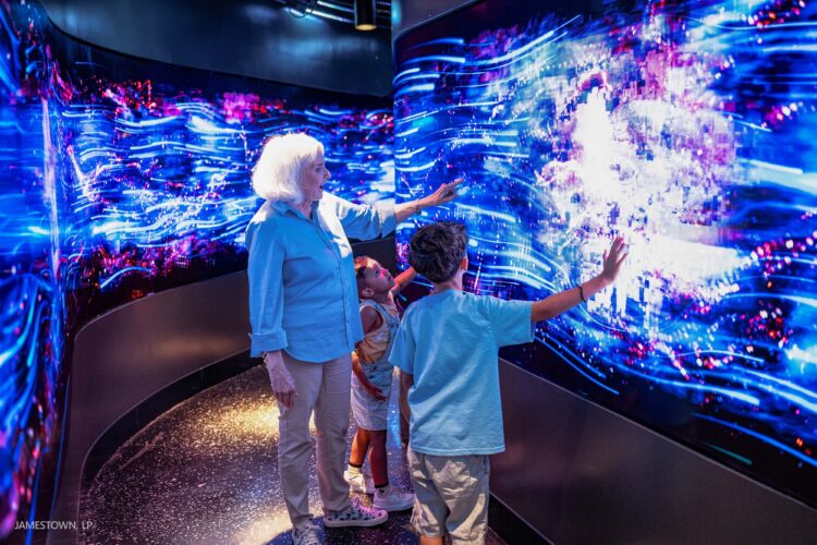 Visitors explore an immersive LED installation powered by SNA Displays in Times Square (Image: Jamestown LP)