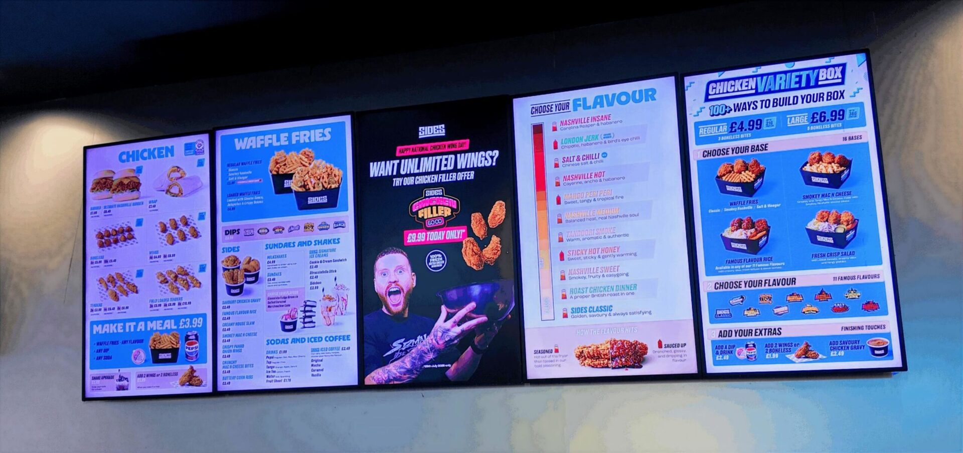 Restaurant Digital Signage: Sides Updates Screen Campaigns In Under 15 Minutes - Digital menu boards at Sides display menu items, flavor choices, and a limited-time promotion (Image: Nowsignage)
Digital menu boards at Sides display menu items, flavor choices, and a limited-time promotion (Image: Nowsignage)