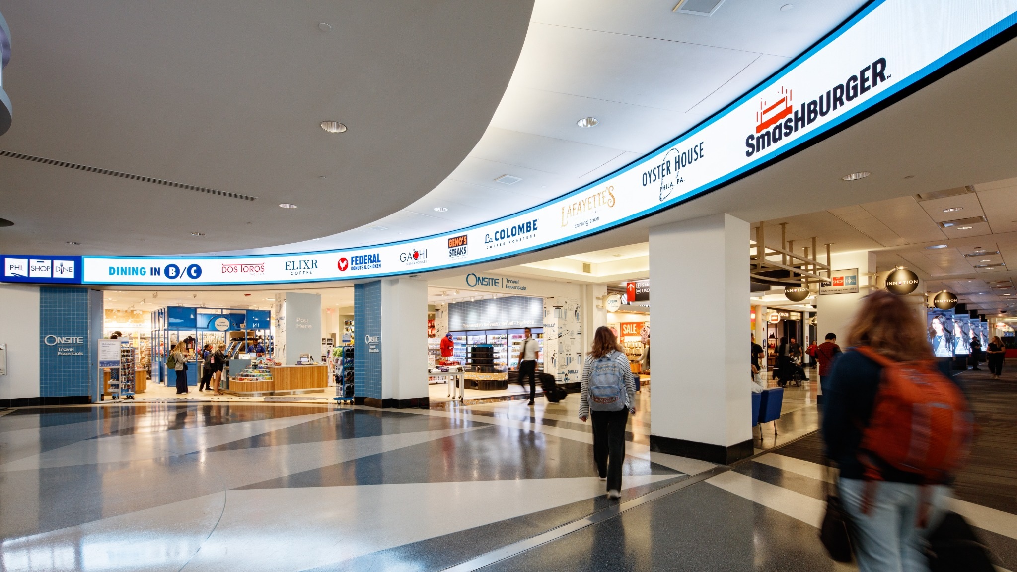 A curved Watchfire LED display highlights dining and retail options at Philadelphia International Airport (Image: Watchfire)