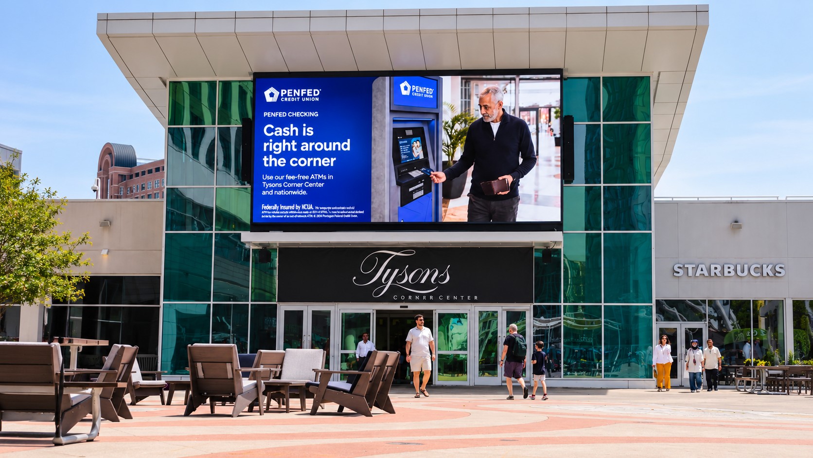 The new outdoor LED display at Tysons Corner Center carries advertising above the entrance to the shopping center's PenFed Plaza (Image: SNA Displays)