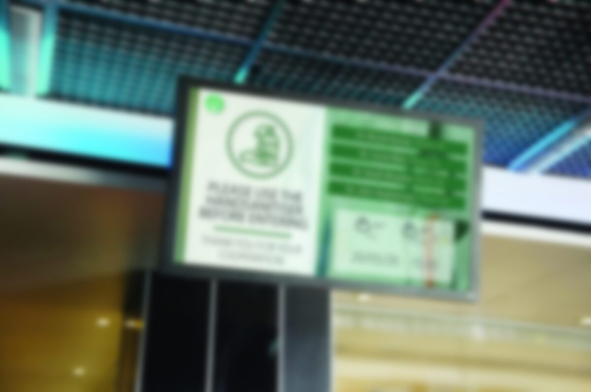 How Businesses Can Remain Connected During COVID-19 - LCD TV with empty copy space at airport