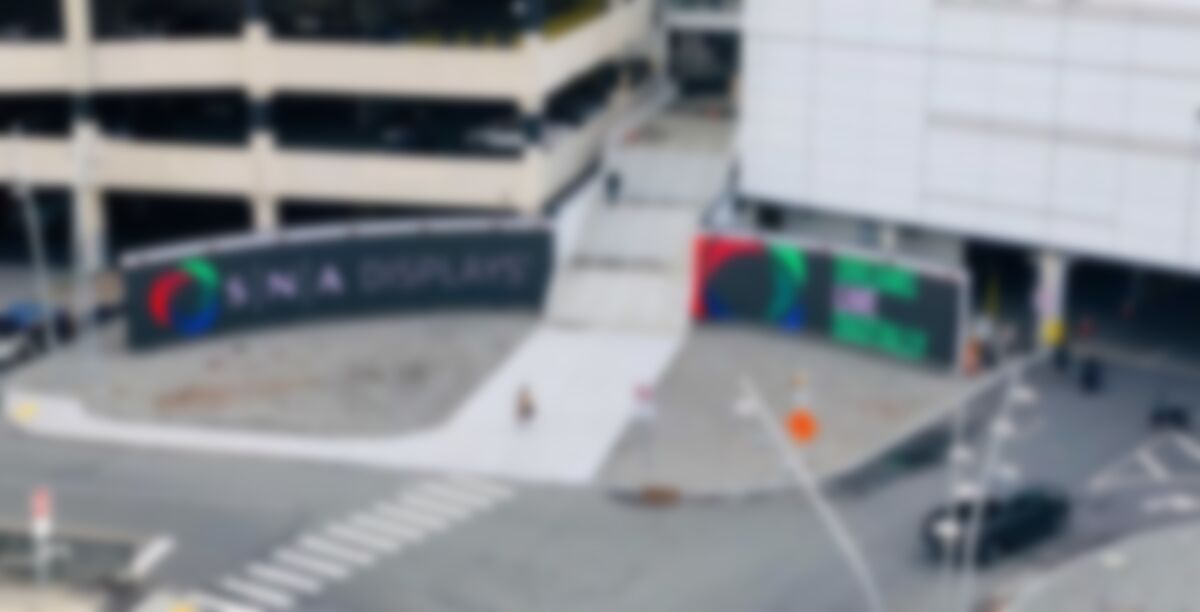 Ground-Level LED Billboard Bisected By Staircase Leading Into NJ Mega-Mall