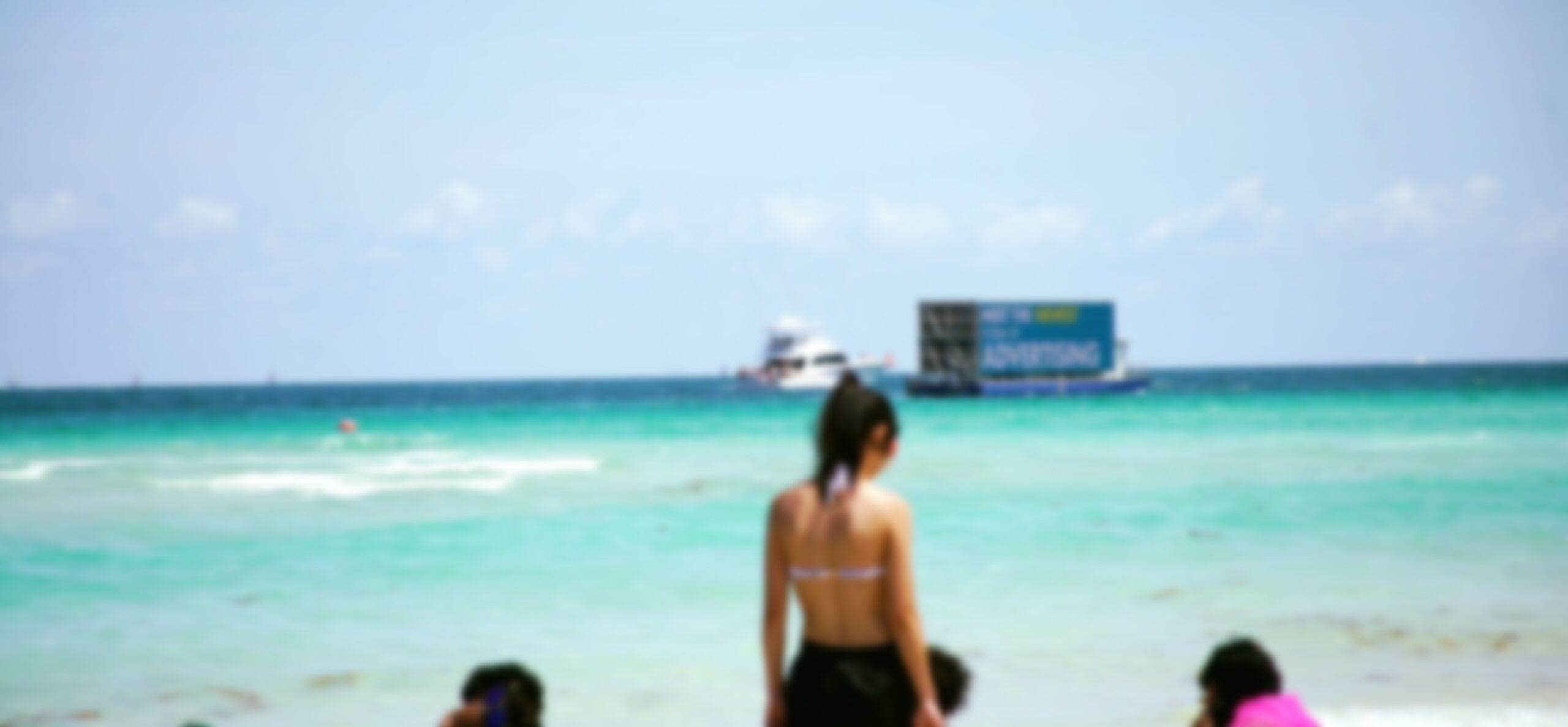 Does Your Idea Of Relaxing At Beach Include Watching Digital Billboards Float By?