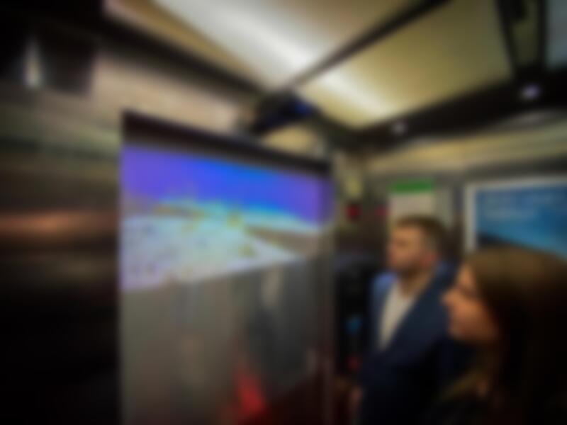 Shanghai Company Develops Short Throw Projector Kit, CMS Software, For Elevators