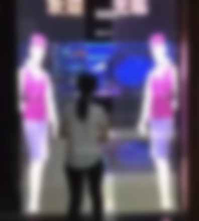 Chinese LED Maker Attaches Transparent LED To Sliding Glass Shop Doors