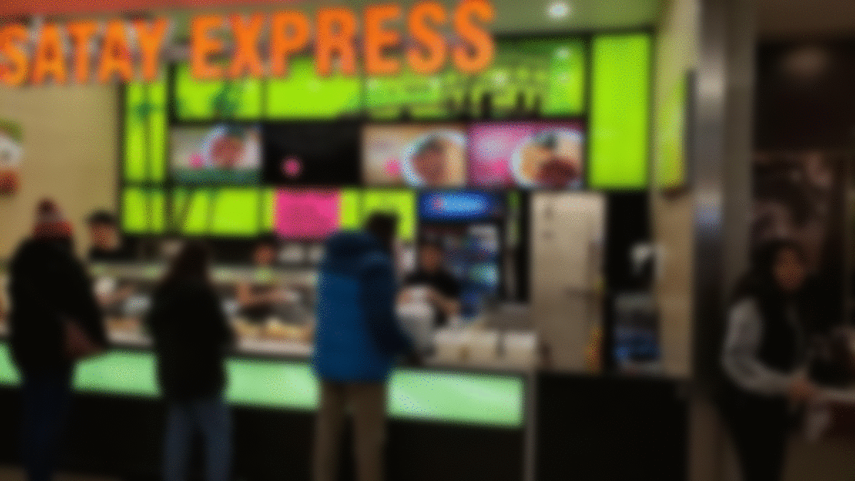 Food Court Vendor Uses Tape, Paper And Scissors to Update Digital Menu Displays