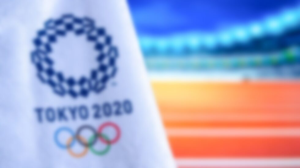 The Olympics Are Finally Live. Here’s Where You Can Grab Content For Digital Signage Screens - TOKYO, JAPAN, FEBRUARY. 14. 2020: Tokyo 2020 Olympic logo, Athletics stadium in background