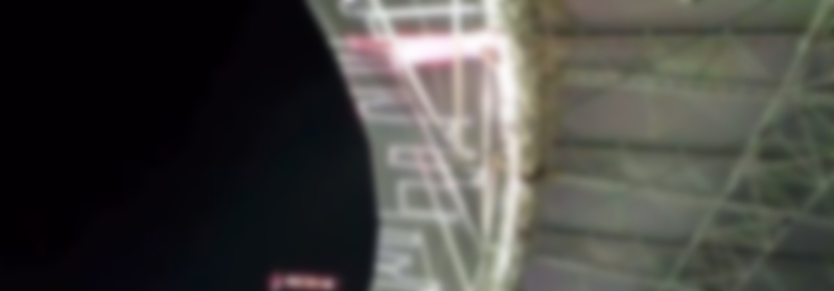 Vast Shanghai Stadium Builds Motion LED Into Seating Bowl Canopy