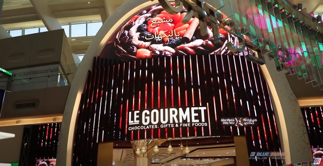 Double-Curved LED Store Facade, Winding LED Ribbons Light Up Duty-Free At Abu Dhabi’s Expanded Airport