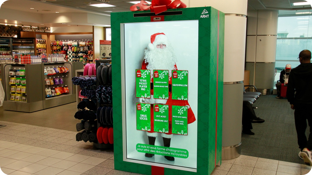 Hologram-ish Santa Offers Gift Ideas To Holiday Travelers At A Toronto Airport