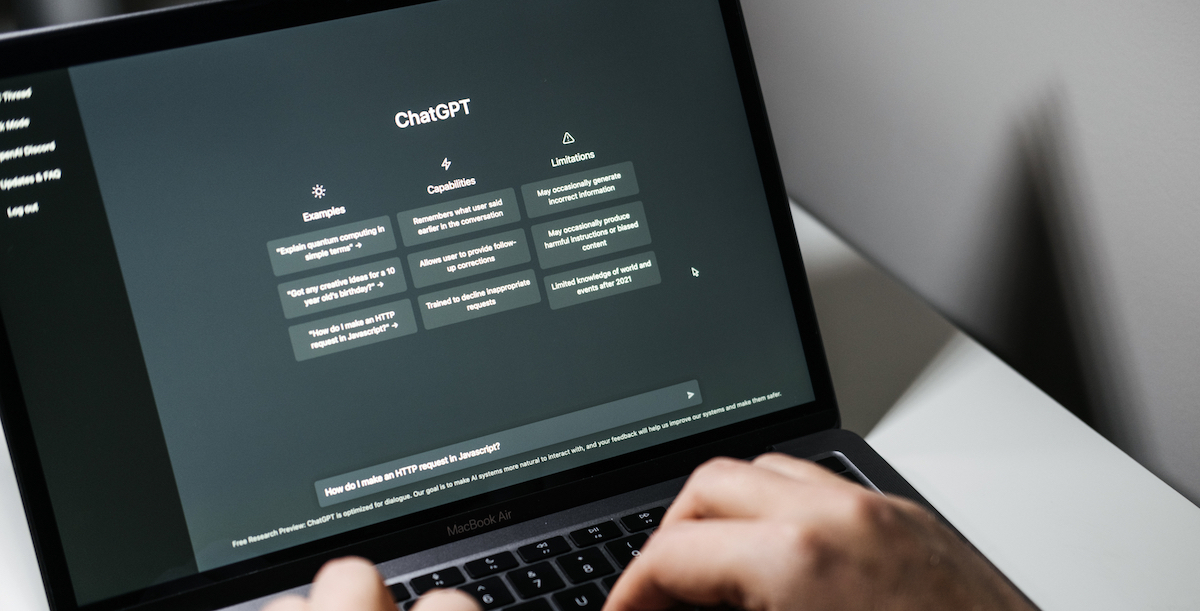 Intuiface To Show Tight AI/GPT-4 Workflow Integrations For Interactive Screens At ISE - Screen with ChatGPT chat with AI or artificial intelligence. Man search for information using artificial intelligence chatbot developed by OpenAI. Warsaw, Poland - December 02, 2022.