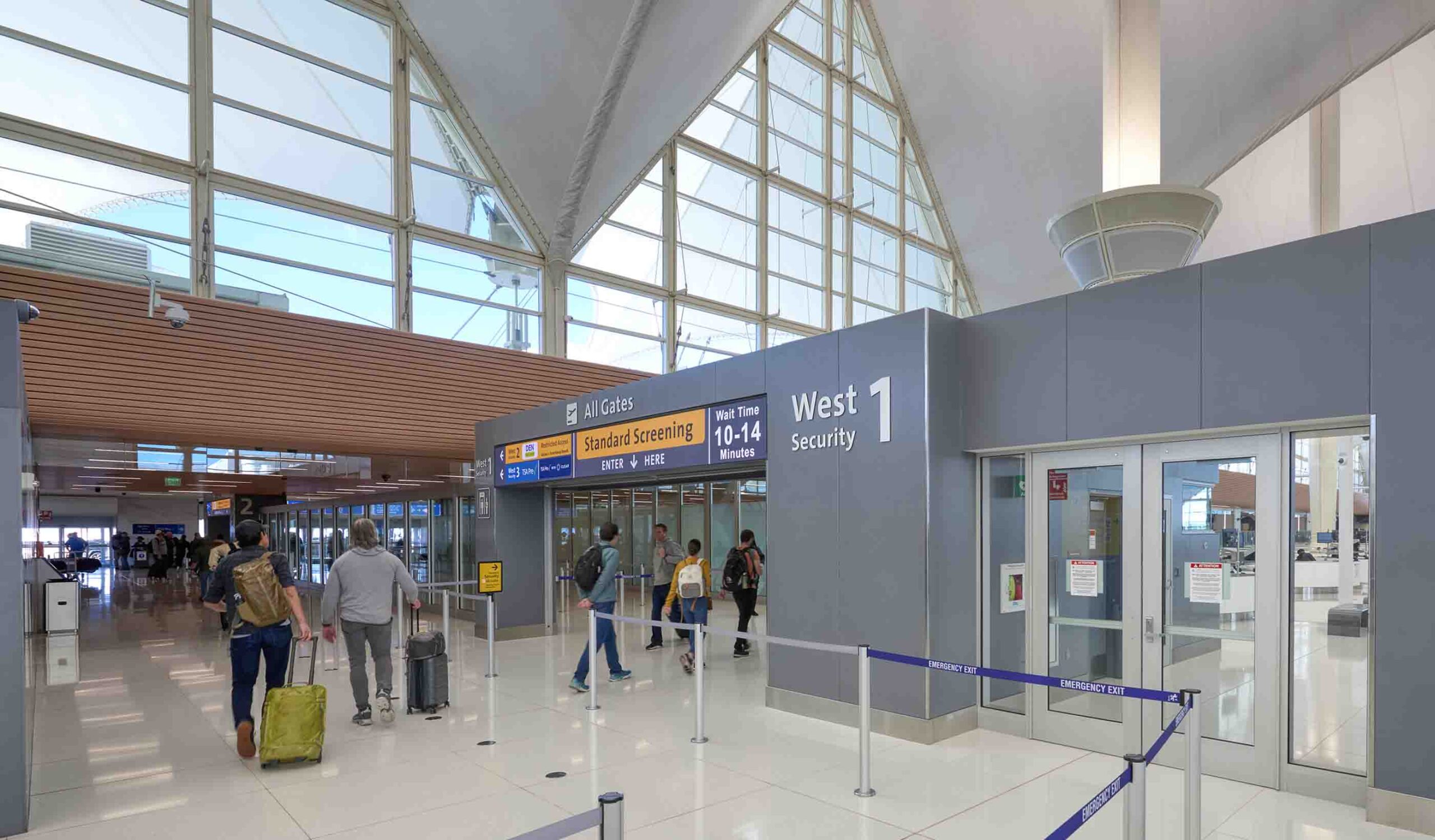 Boring But Good: Denver’s Busy Airport Uses LED Header Banner At New TSA Checkpoint - People entering the security area