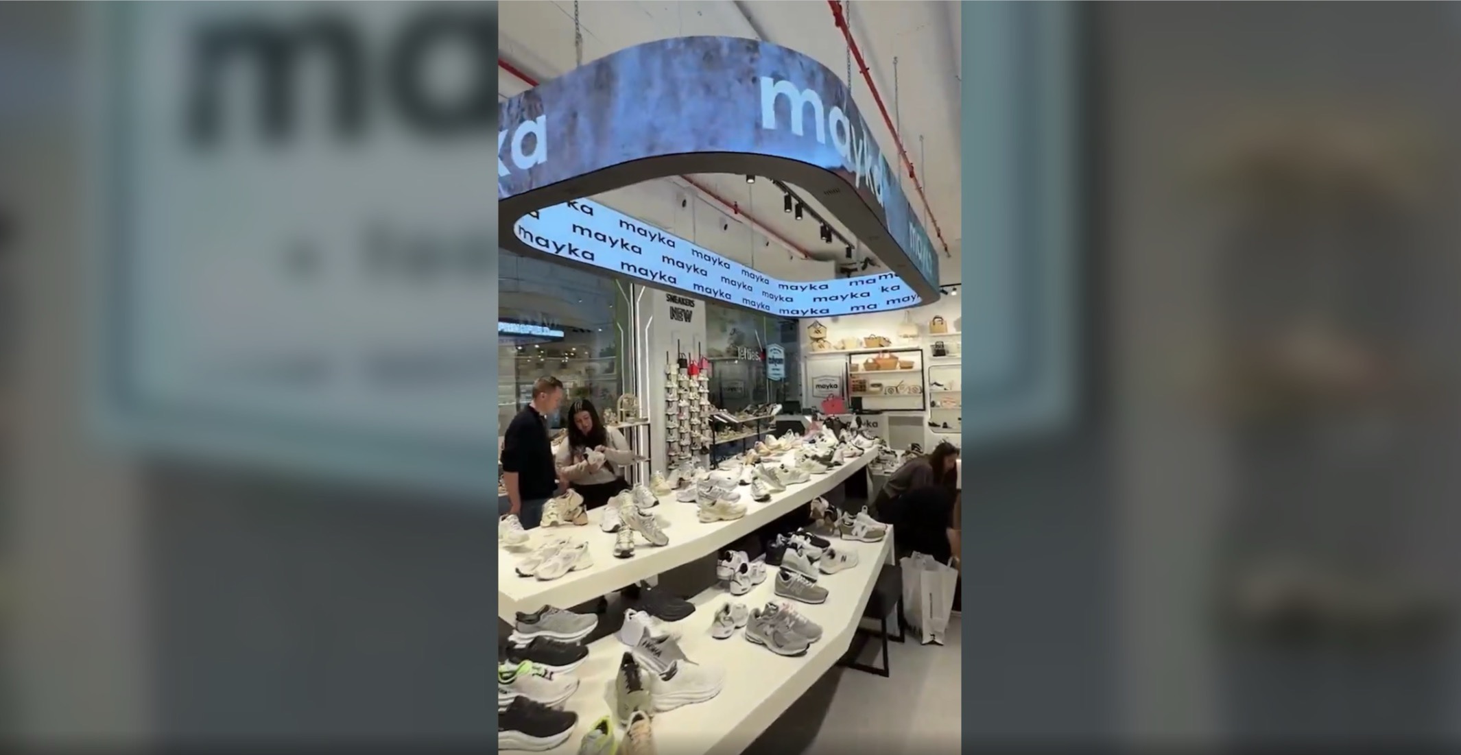 LED Mainstreamed: A Squircle Of LED Displays Creates Animated Halo For Coastal Spain Shoe Store