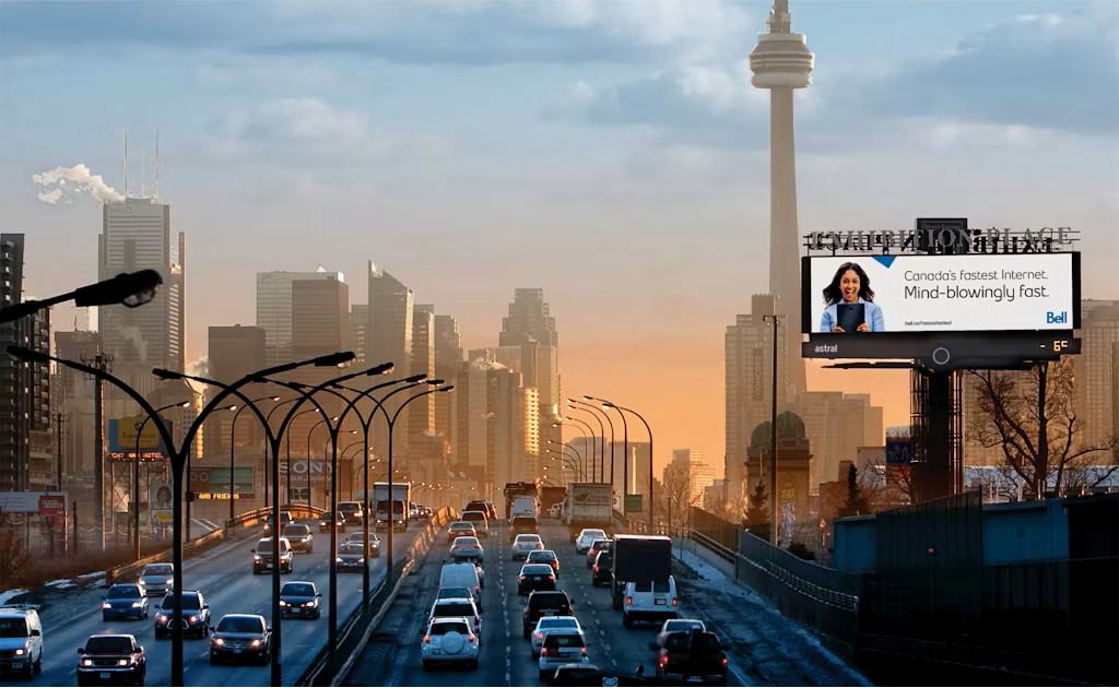 Heavier congestion in cities such as Toronto (pictured) and Vancouver is increasing the time commuters spend in view of roadside OoH displays. (Image: Bell Media)